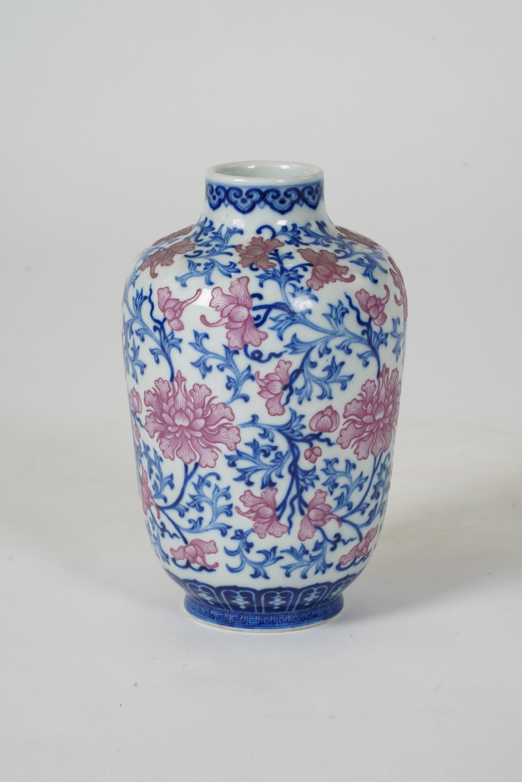 A Chinese pink enamelled and underglaze blue vase, six character Qianlong seal mark to base, possibly Republic period